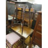 Two rectangular walnut Arts and Crafts occasional tables with ring turned supports and stretchers