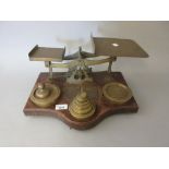 Pair of large 19th Century brass and oak postal scales with weights