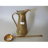 Copper lidded jug and a brass ladle