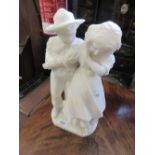 Carved alabaster group of a boy and girl, 15ins high