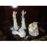 Group of four boxed Lladro figures, ' Oopsy Daisy ', ' It's a Girl ', ' It's a Boy ' and '