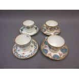 Group of four various 19th Century Minton porcelain cabinet cups and saucers decorated with birds