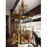 Large good quality 20th Century hall lantern in 18th Century style, the scroll surmount above a
