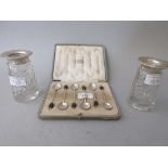 Cased set of six silver bean handled coffee spoons and a pair of silver mounted specimen vases
