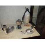 Four various Copenhagen figures of birds including a penguin (one at fault)