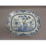 18th Century Chinese octagonal meat platter, blue and white decorated with flowers on a terrace