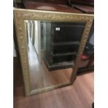 Reproduction rectangular gilt framed bevelled edge wall mirror with relief moulded frame