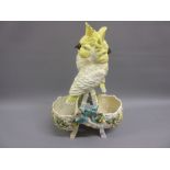 19th Century porcelain double flower basket mounted with two figures of parakeets (restored)