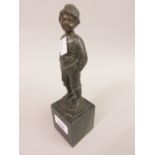 Small Dutch brown patinated bronze figure of a boy mounted on a square marble plinth base