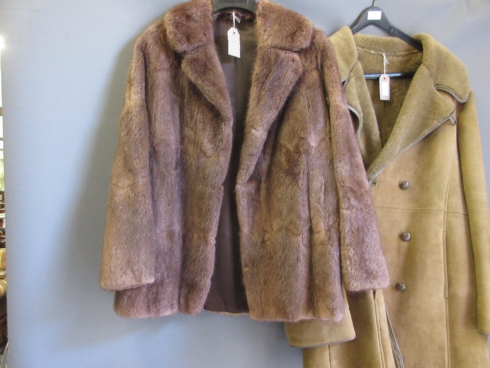 Ladies mid brown fur jacket and a sheepskin coat