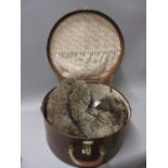 Early 20th Century Fordite simulated leather hat box containing an early 20th Century fur stole,