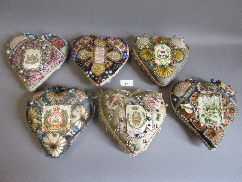 Group of six World War I sweetheart pin cushions, bearing Regimental insignias