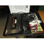 Sega Master System II power base (control pad at fault), with original carry case and various
