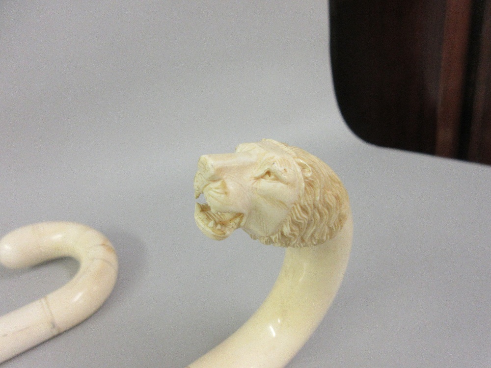 19th Century Indian carved ivory walking cane with lions head handle, together with another similar - Image 2 of 4