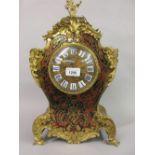 Late 19th or early 20th Century buhl red stained tortoiseshell and cut brass two train mantel clock