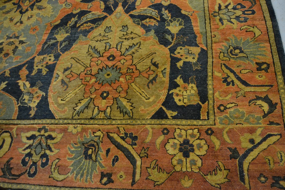 Agra carpet of all-over floral design on burgundy ground with multiple borders, 119ins x 167ins - Image 2 of 6