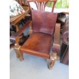 Hardwood and leather hide safari chair on turned supports, 28ins wide, 26ins deep