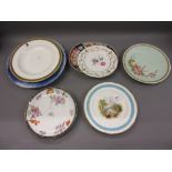 Two 19th Century cabinet plates painted with a lake scene and flowers together with a quantity of