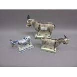 Rye Pottery 2002 figure of a donkey, similar figure of a foal and a small Delft blue and white