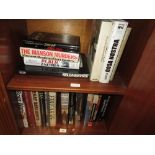 Approximately twenty books on guns, military, the Mafia and war-fare