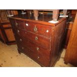 Late George III oak straight front chest of two short over three long drawers with brass ring
