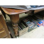 Victorian mahogany pull-out extending dining table, the moulded top above a moulded frieze raised on