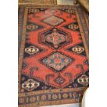 Vyse rug with repeating medallion design in shades of deep red and blue (with damages), 80ins x
