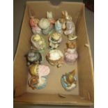 Group of eleven Royal Albert and Beswick Beatrix Potter figures