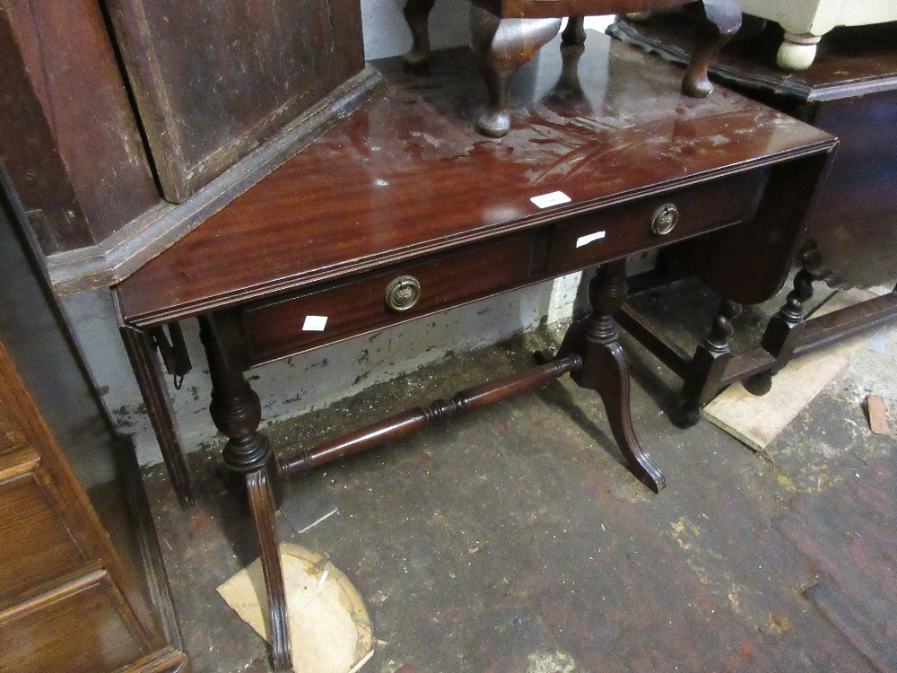 20th Century mahogany drop-leaf two drawer sofa table on swept supports with brass caps and casters