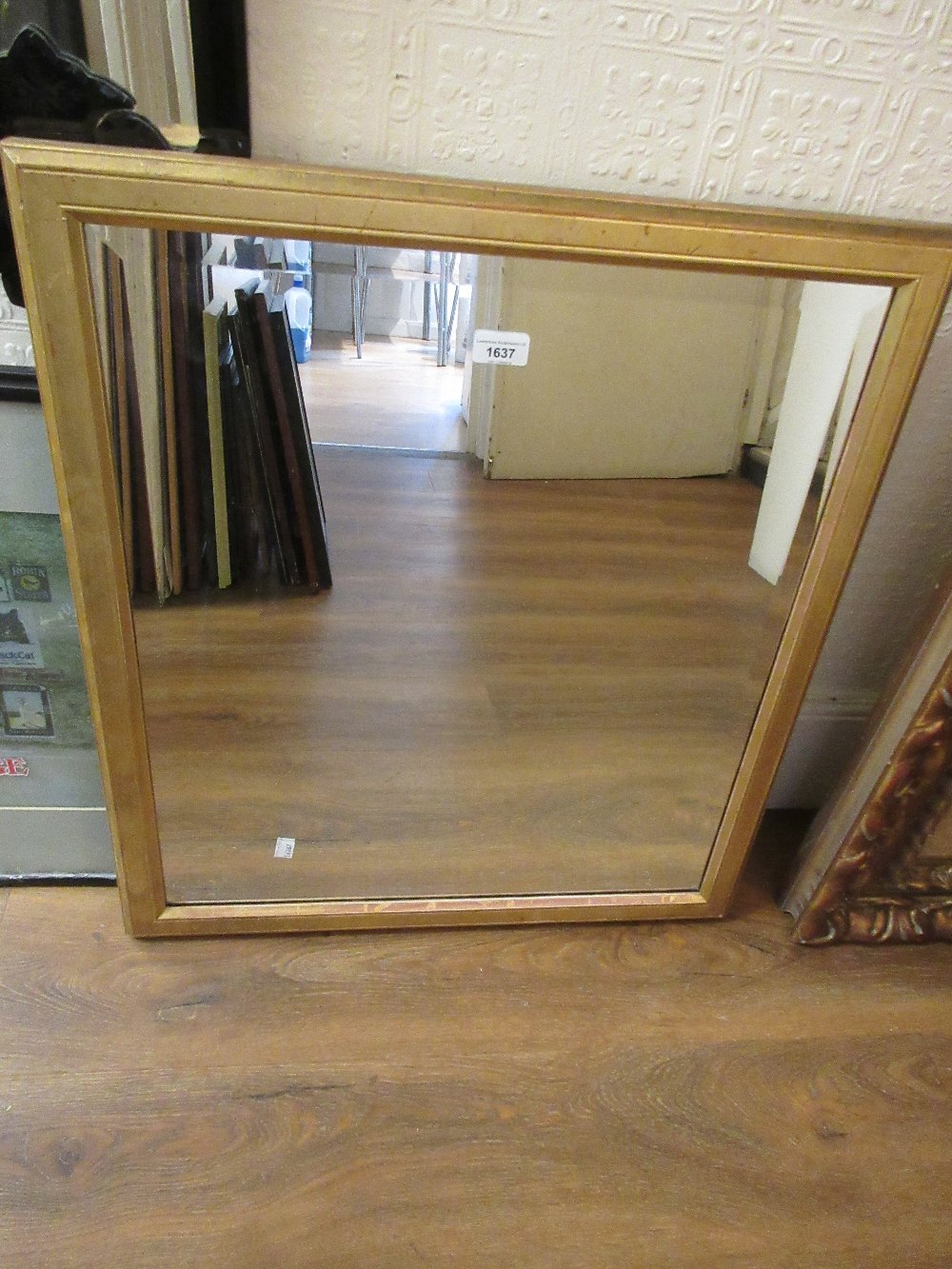 Rectangular gilt framed bevelled edge hanging wall mirror