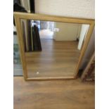 Rectangular gilt framed bevelled edge hanging wall mirror