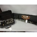 Two Boosey and Hawkes cased oboes