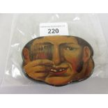 19th Century papier mache snuff box, the cover painted with a mans face