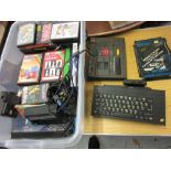 Sinclair ZX Spectrum keyboard together with a quantity of various games etc.