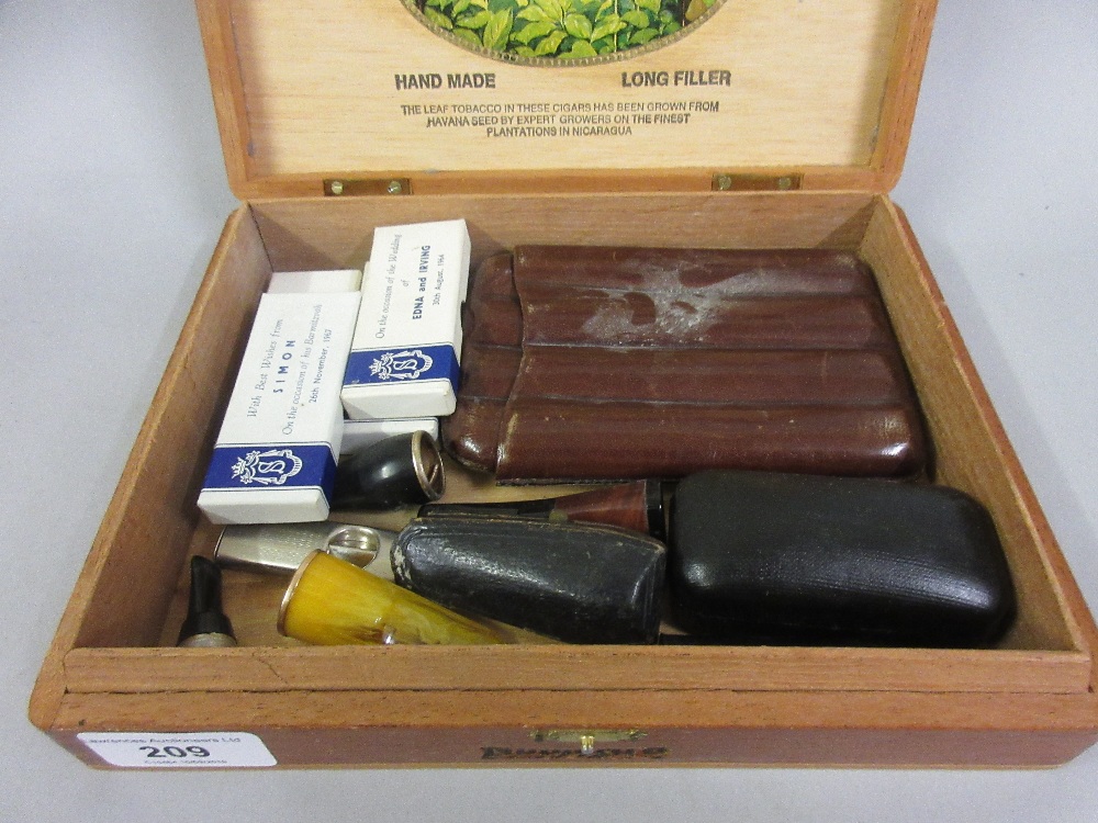 Small cigar box containing a quantity of various cheroots, cigar cutter and other smoking ephemera