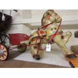 Child's mid 20th Century painted metal ride-on horse and trap