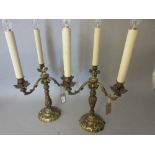 Pair of ornate cast brass three branch candelabra