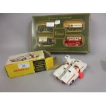Boxed Dinky No. 105 Maximum Security vehicle, together with a boxed set of four Harrods trade