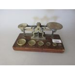 Pair of 19th Century brass and oak postal scales by S. Mordan and Co.