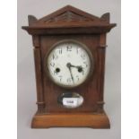 Ansonia walnut cased mantel clock, together with an ebonised two train mantel clock