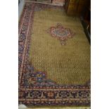 Mid to late 20th Century Hamadan carpet with a medallion and all-over stylised flower head design in