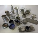 Box containing a collection of various pewter salts, condiments, toast rack, glass holders and a