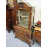 Late 18th or early 19th Century Dutch marquetry side cabinet, the arched top above a glazed panelled