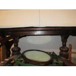 Small reproduction oak refectory style table, together with a similar two door bookcase with