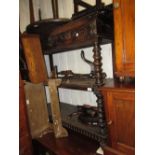 19th Century oak three tier buffet having two mask head carved drawers with barley twist supports