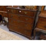 Early 18th Century walnut chest, the crossbanded and moulded top above two short and three long