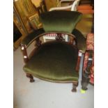 Edwardian mahogany and upholstered tub shaped chair raised on cabriole front supports