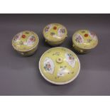 Set of four early 20th Century Chinese serving bowls with covers and inserts, enamel decorated