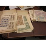 Three folders containing a collection of French Colonial stamps, mainly in sheets and full sheets,