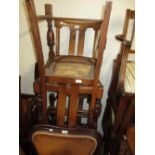 Group of four 1930's oak dining room chairs with drop in seats